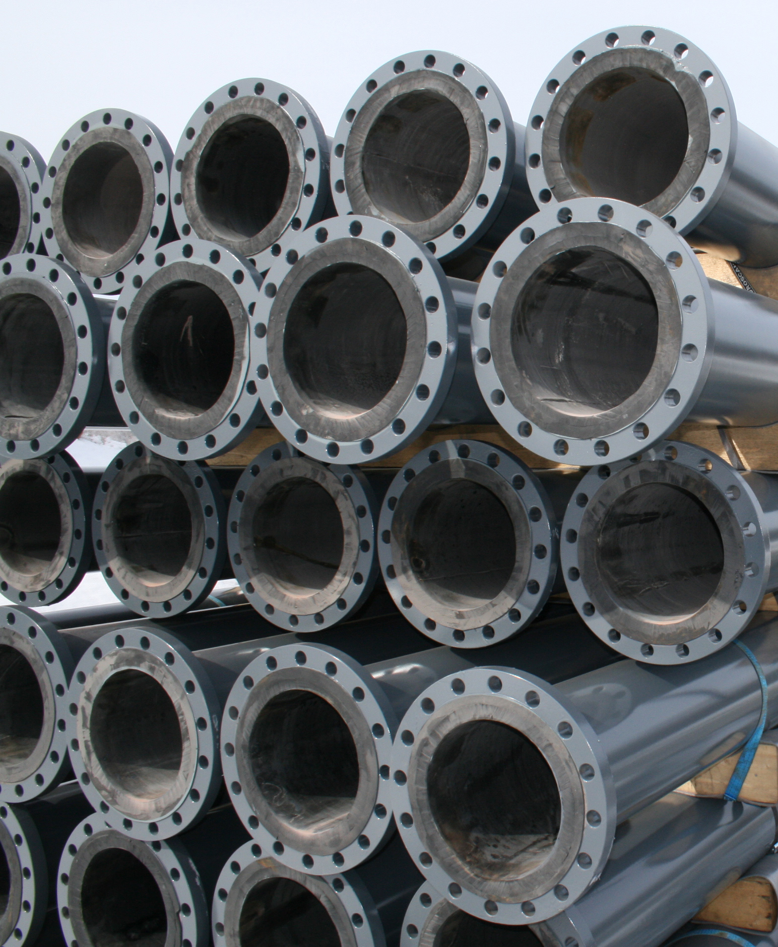 Pile of rubber lined steel pipes.