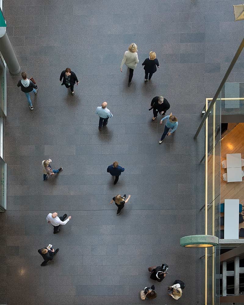 People walking pictured from above.